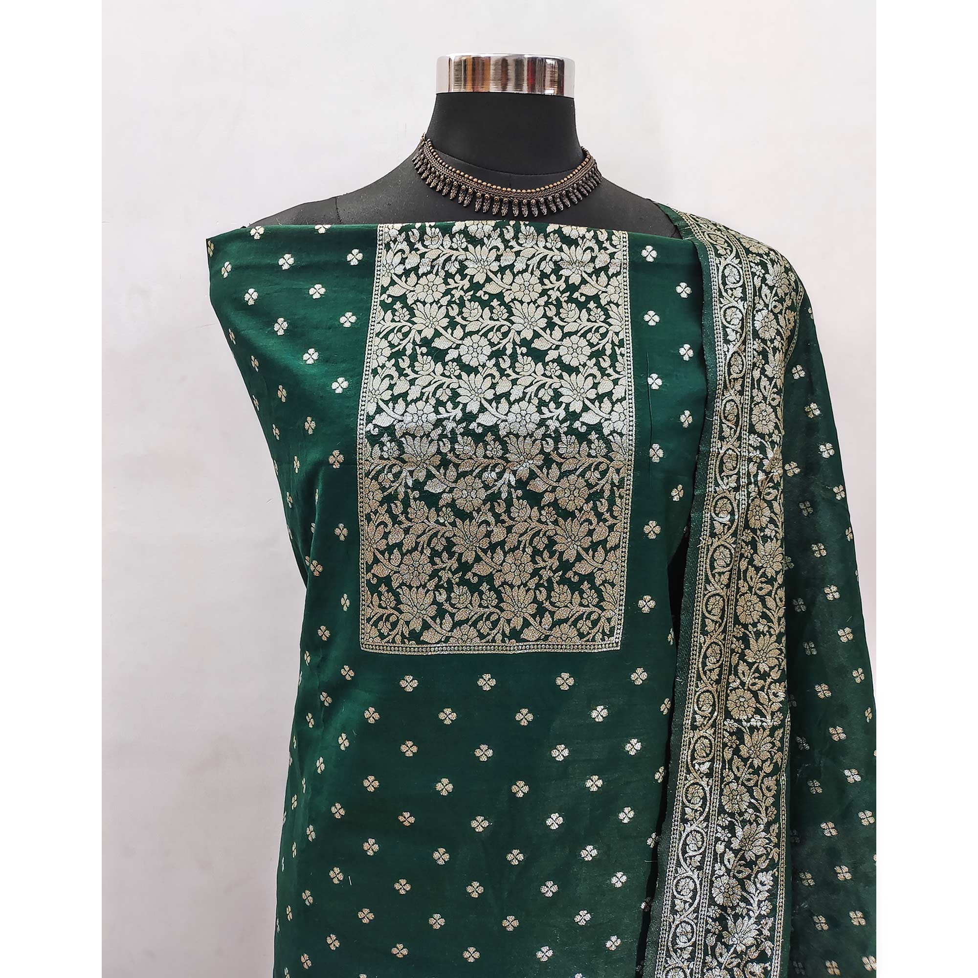 Luxurious Green Banarasi Silk With Floral Zari Weaving Work Dress Material