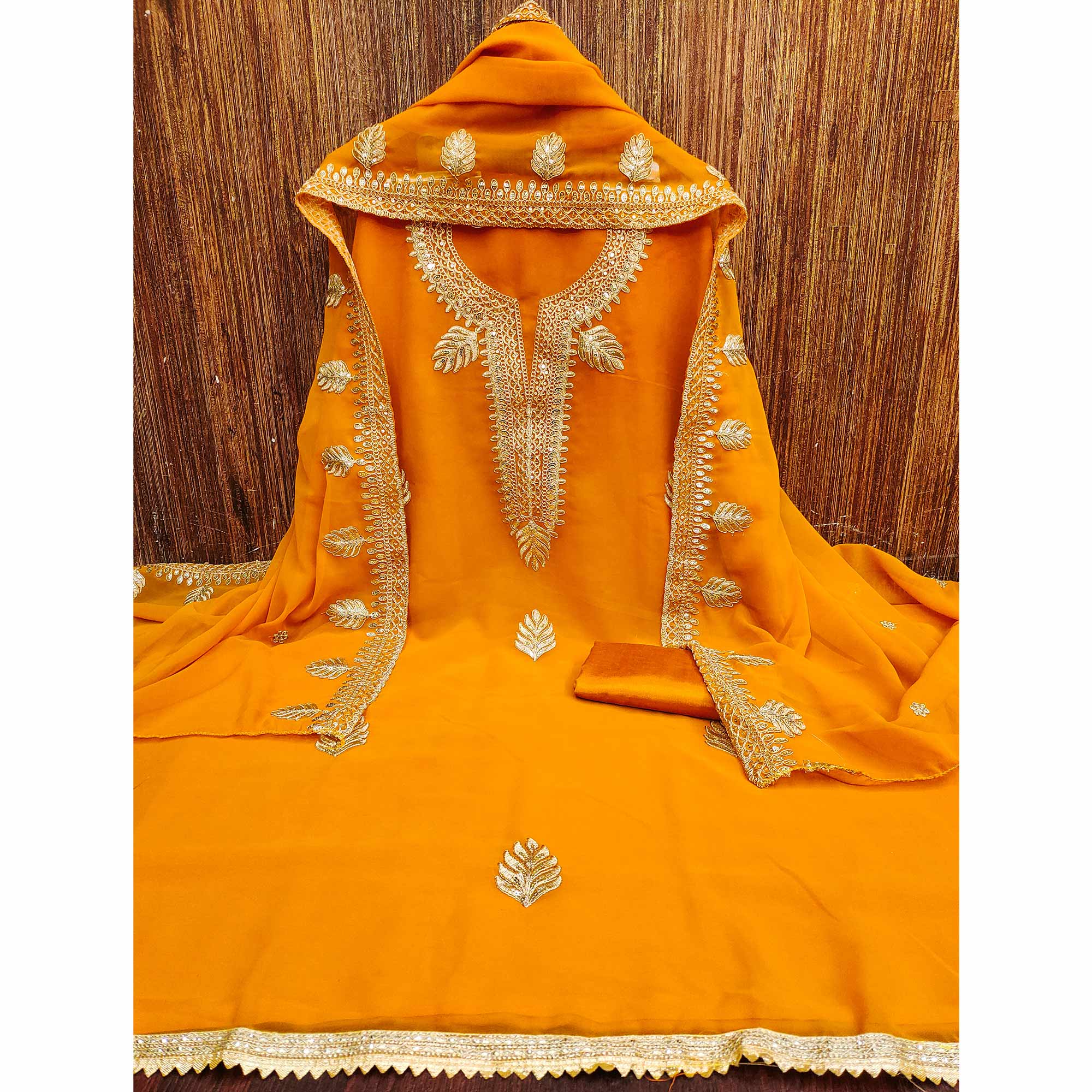 Orange Ethnic Dress Material in Georgette with Embroidery