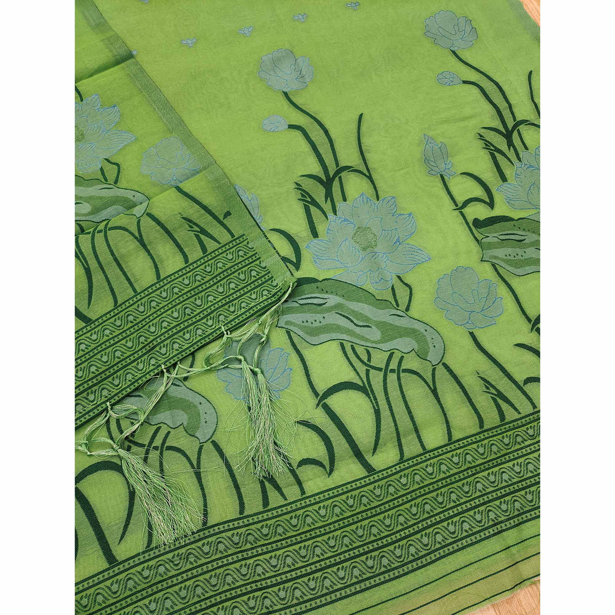 Green Ethnic Dress Material Showcasing Handloom Style Floral Zari Weaving