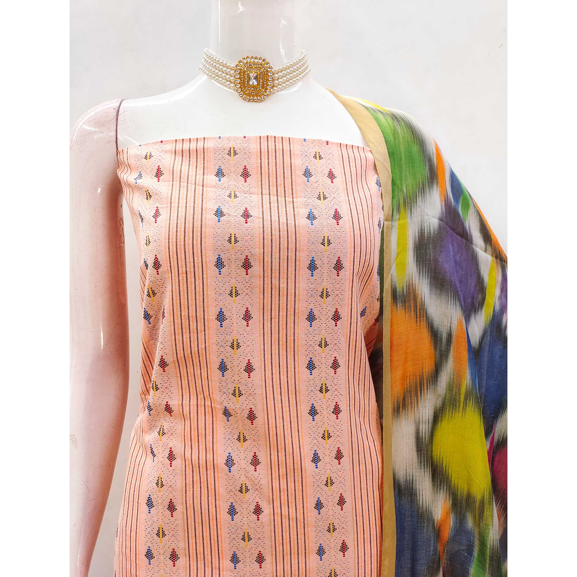 Drape Yourself In Luxury Peach Woven Cotton Blend Dress Material
