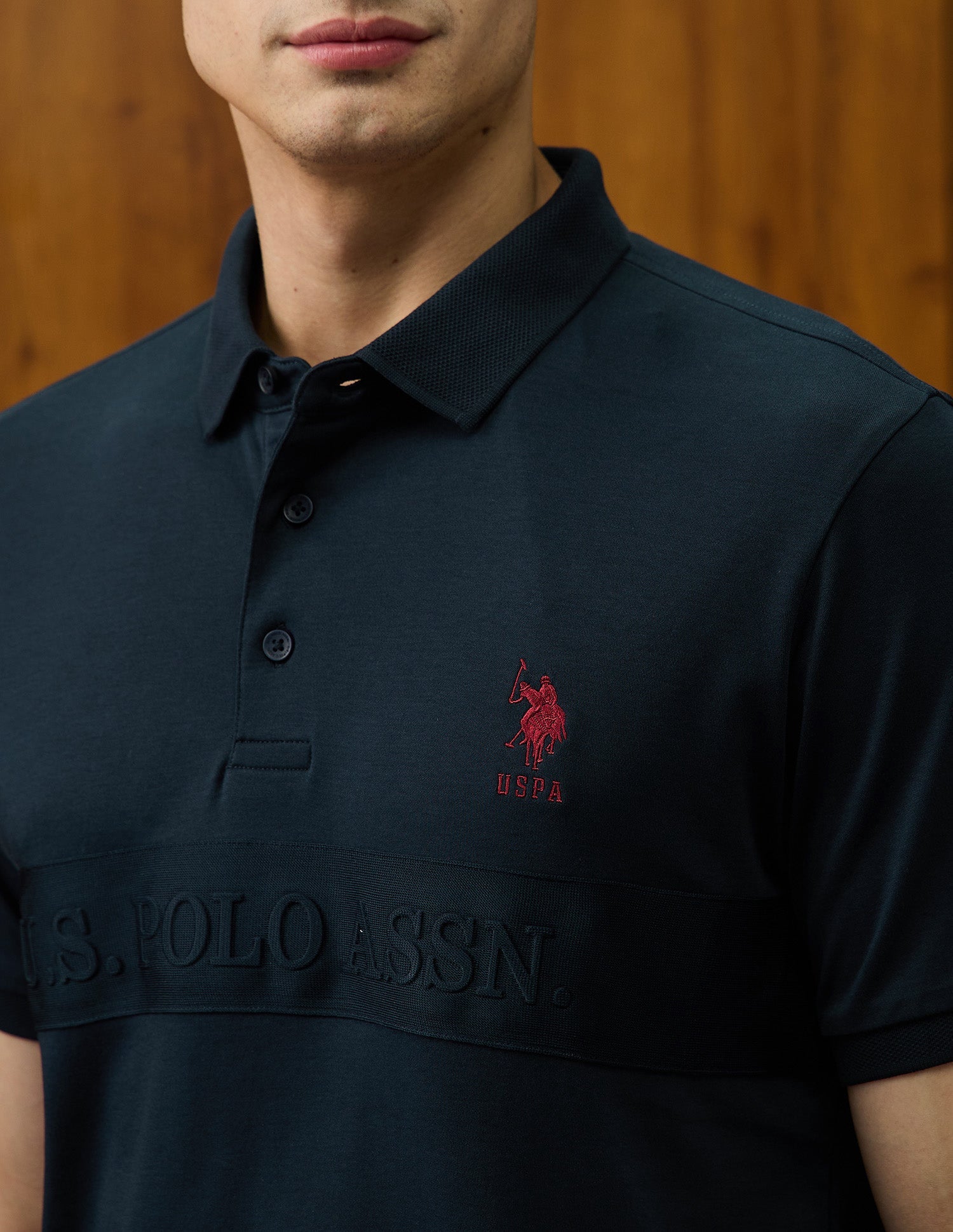 Brand Embossed Varsity Theatre Polo Shirt