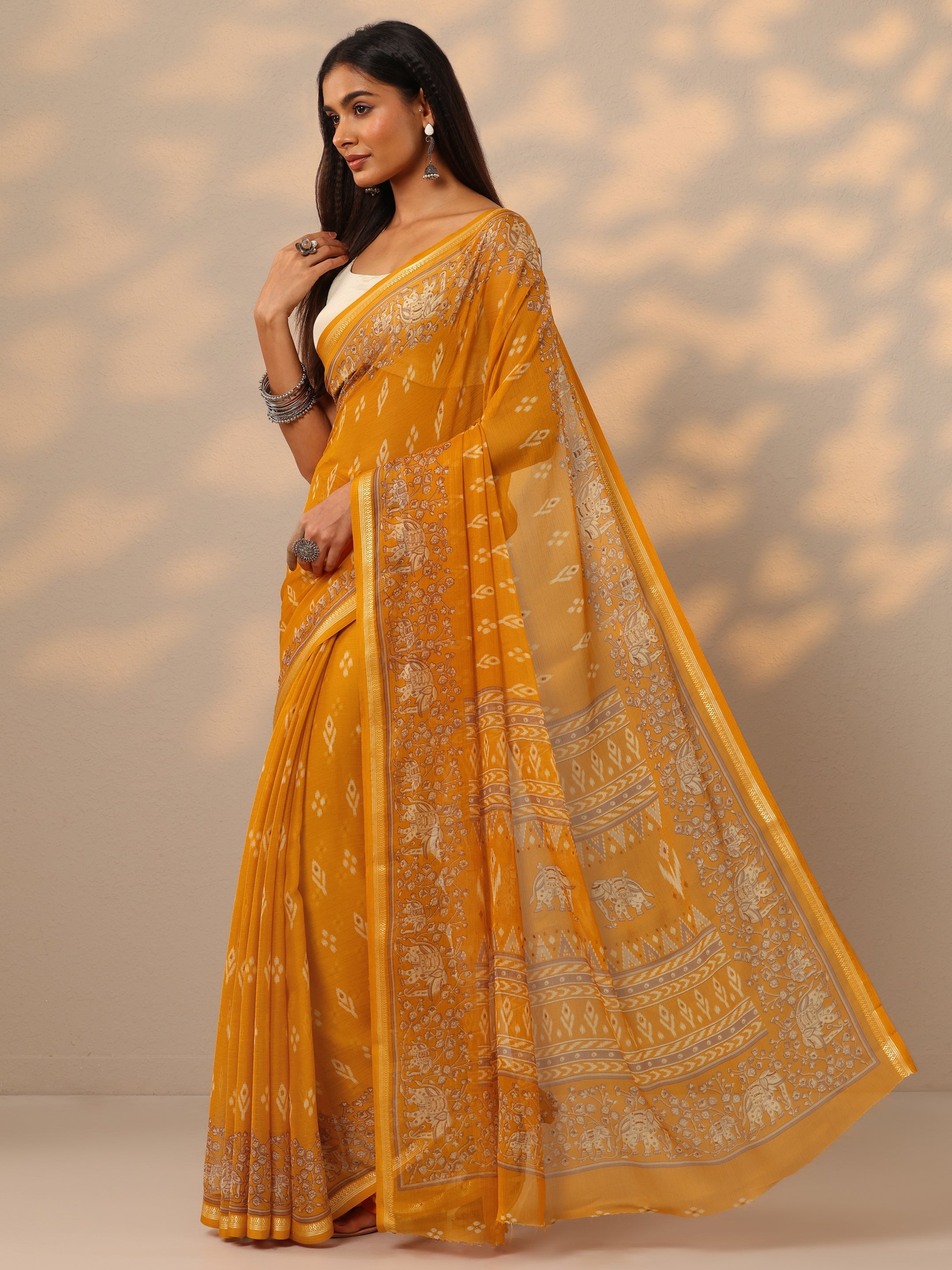 Mustard  Ikat Printed Chiffon Saree With Unstitched Blouse Piece