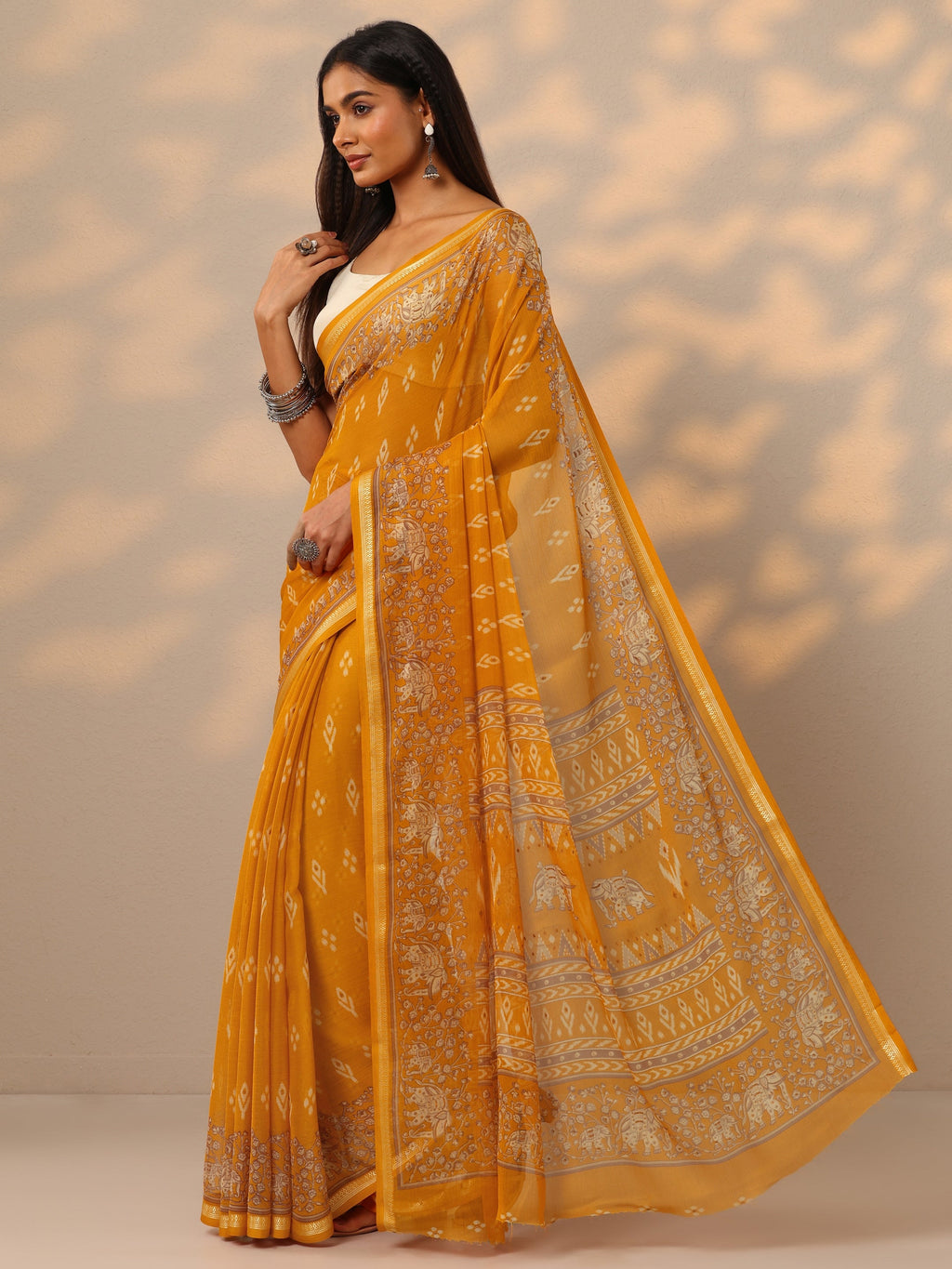 Mustard  Ikat Printed Chiffon Saree With Unstitched Blouse Piece