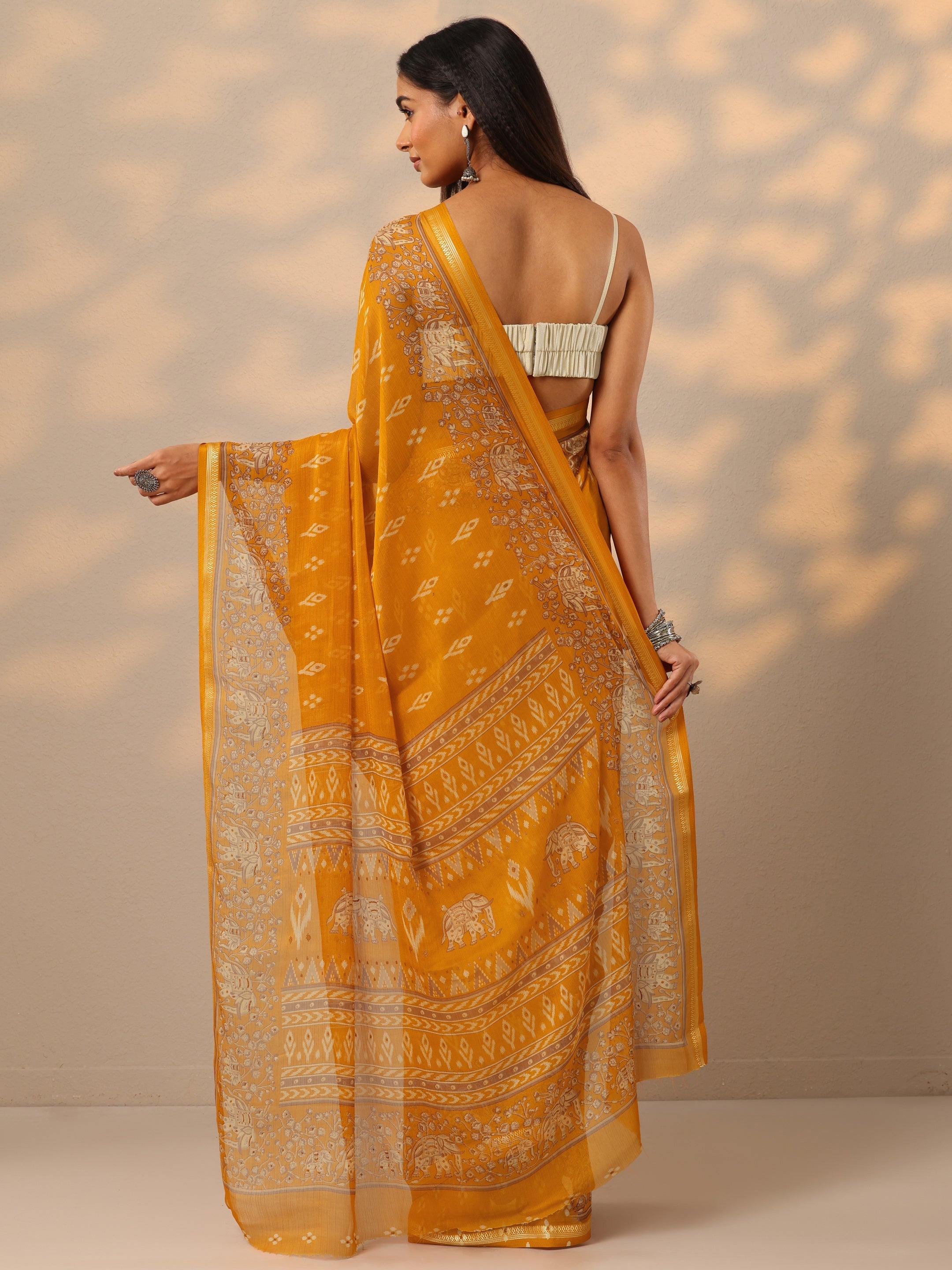 Mustard  Ikat Printed Chiffon Saree With Unstitched Blouse Piece