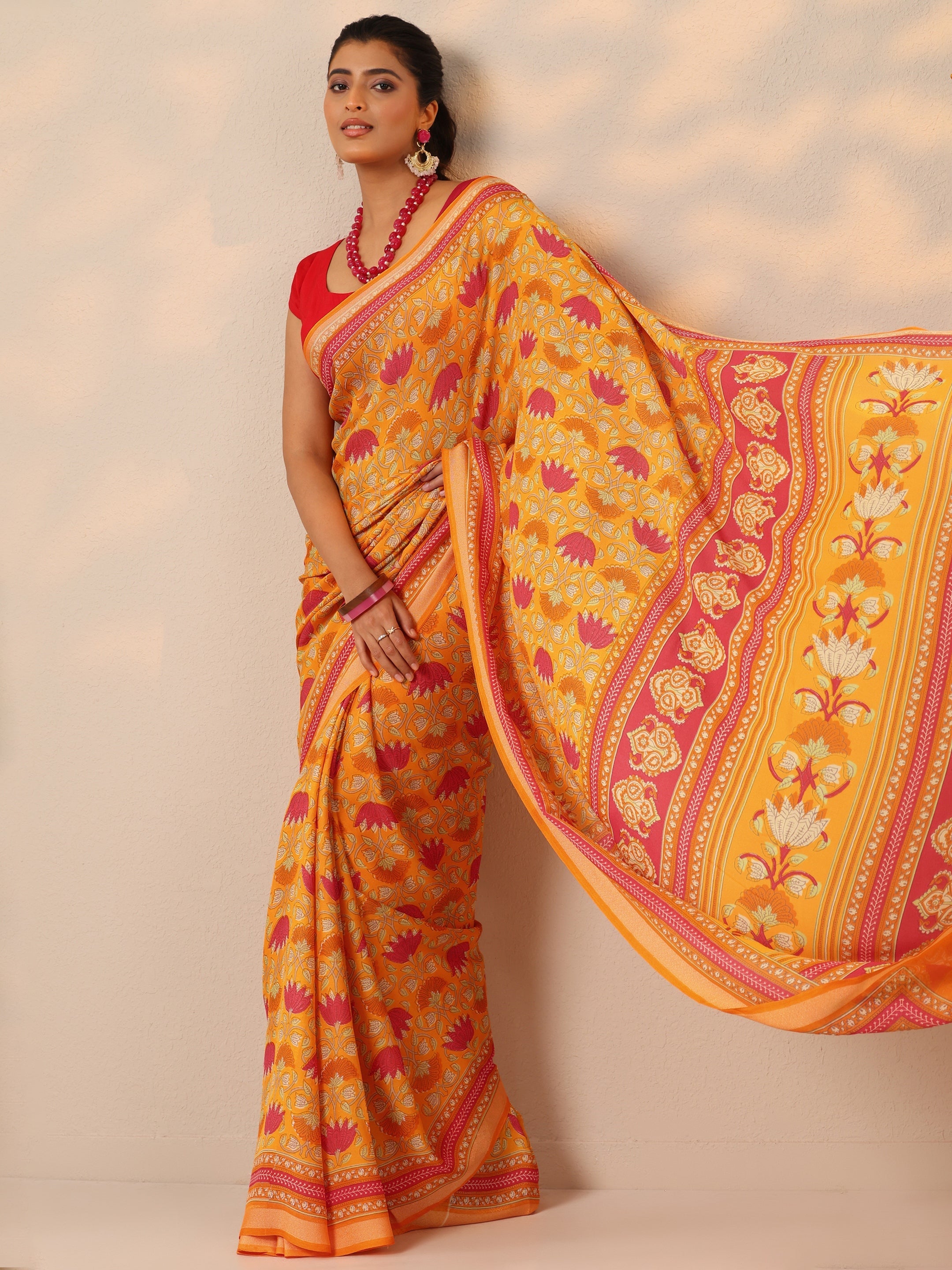 Mustard Printed Georgette Sarees With Unstitched Blouse Piece
