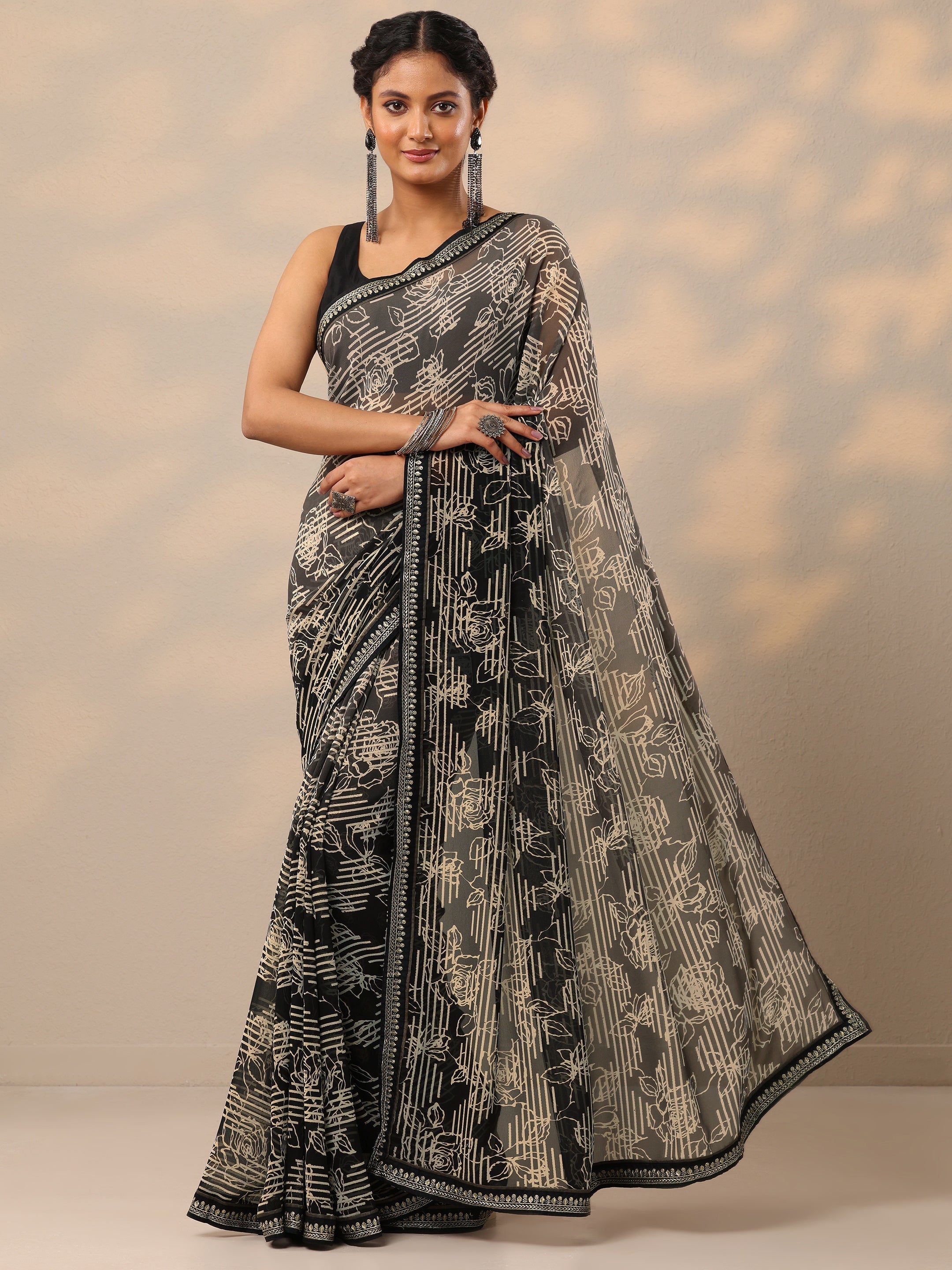 Black Printed Georgette Saree With Unstitched Blouse Piece