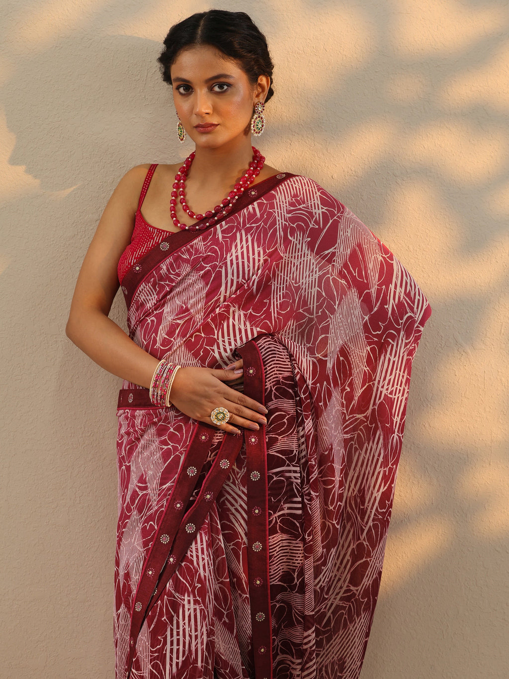 Maroon Printed Georgette Saree With Unstitched Blouse Piece