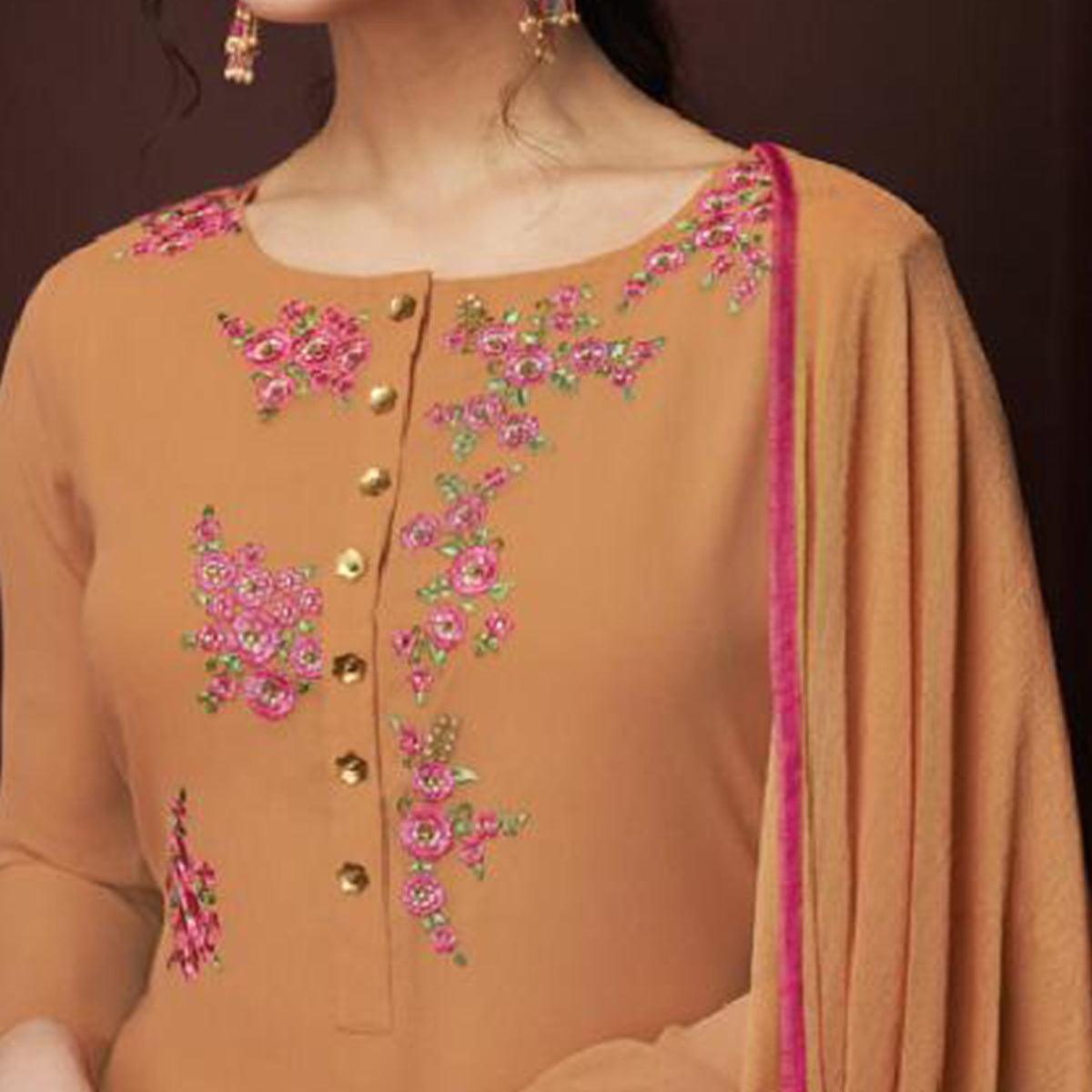 Appealing Orange Colored Partywear Embroidered Georgette Suit