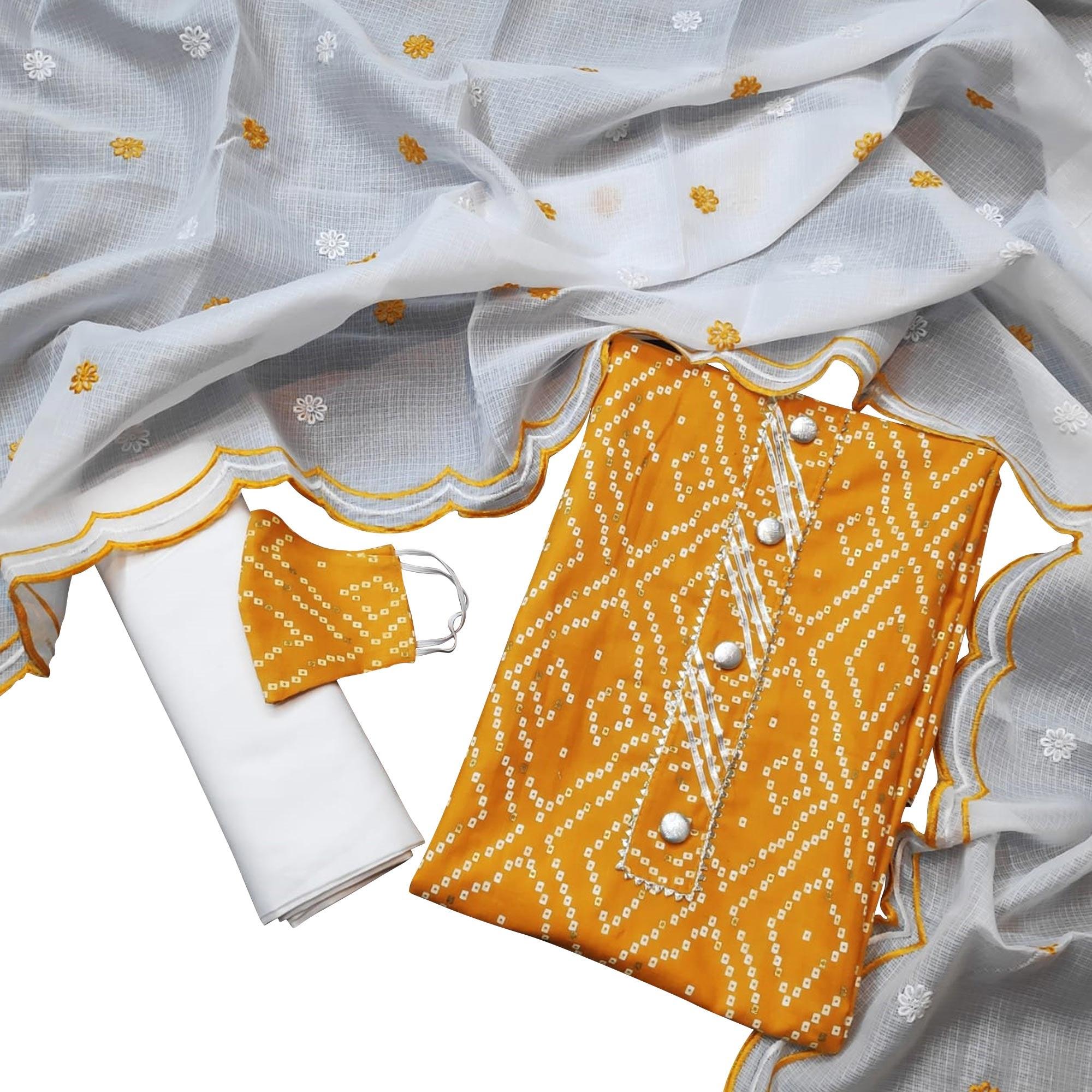 Breathtaking Mustard Yellow Colored Casual Wear Printed Cotton Dress Material