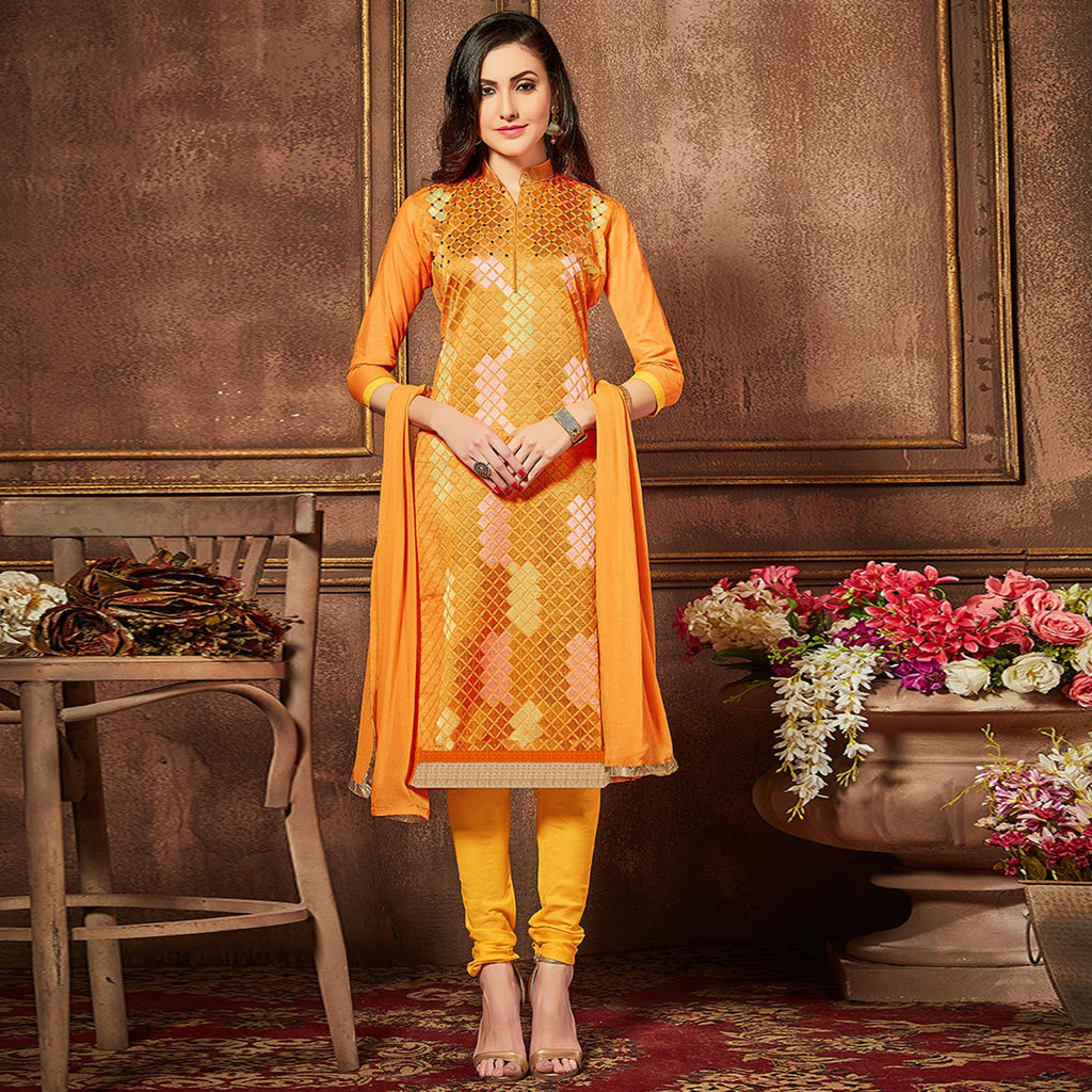 Intricate Orange Colored Party Wear Embroidered Cotton Suit