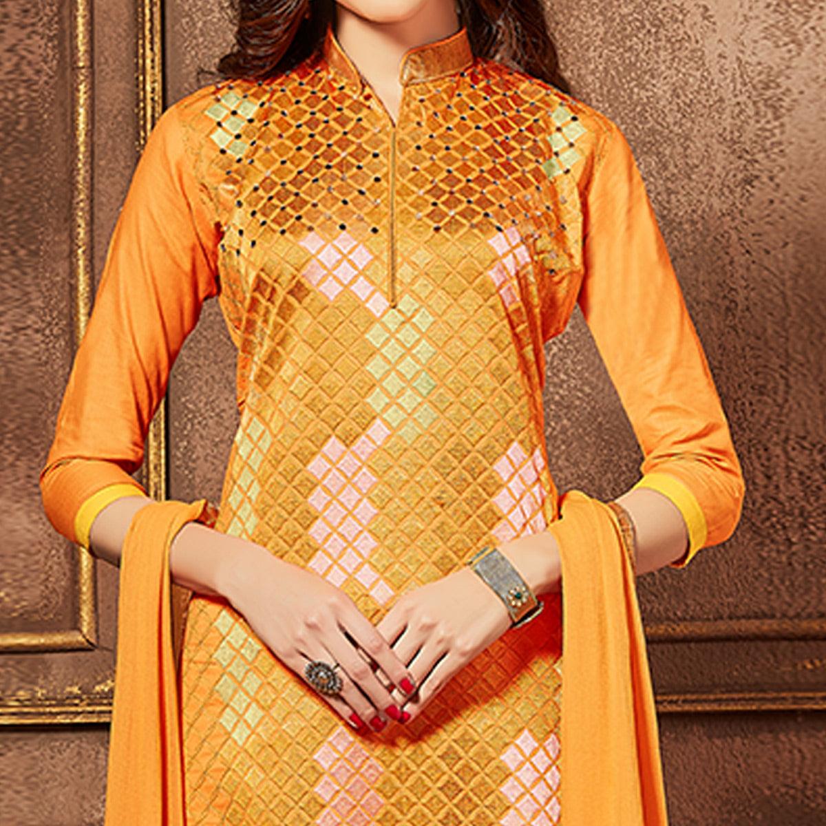 Intricate Orange Colored Party Wear Embroidered Cotton Suit