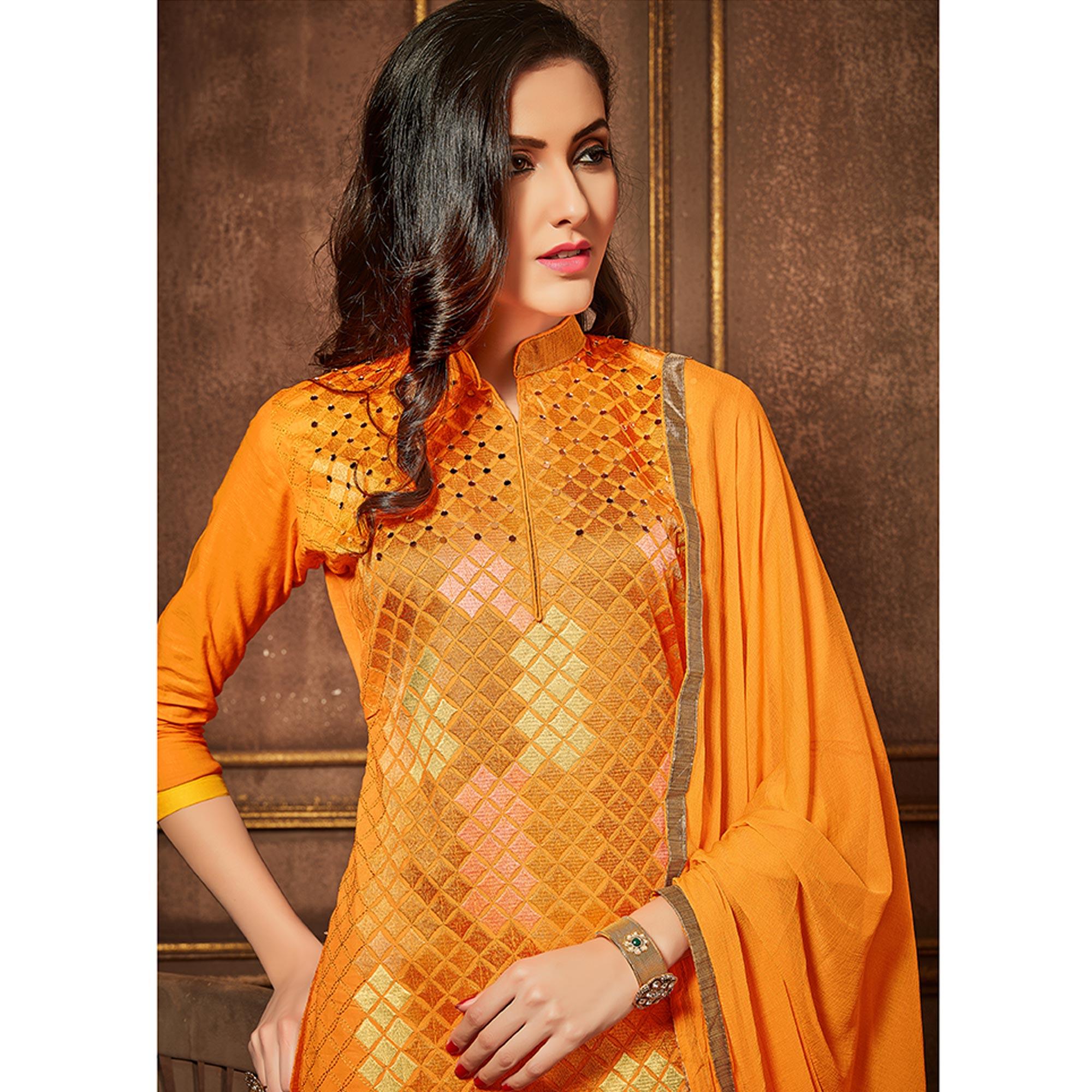 Intricate Orange Colored Party Wear Embroidered Cotton Suit