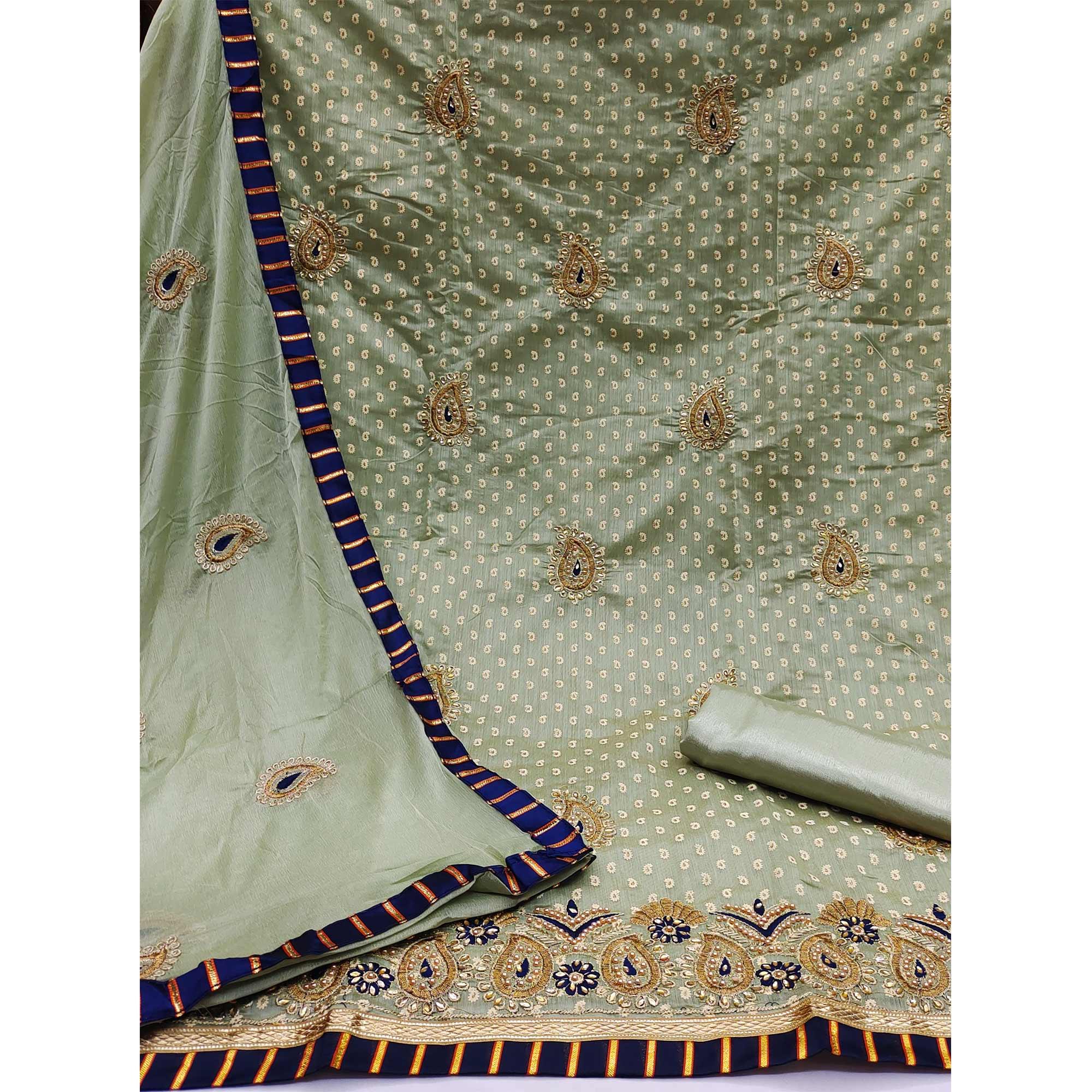 Pista Green Embroidered Fancy Fabric Dress Material