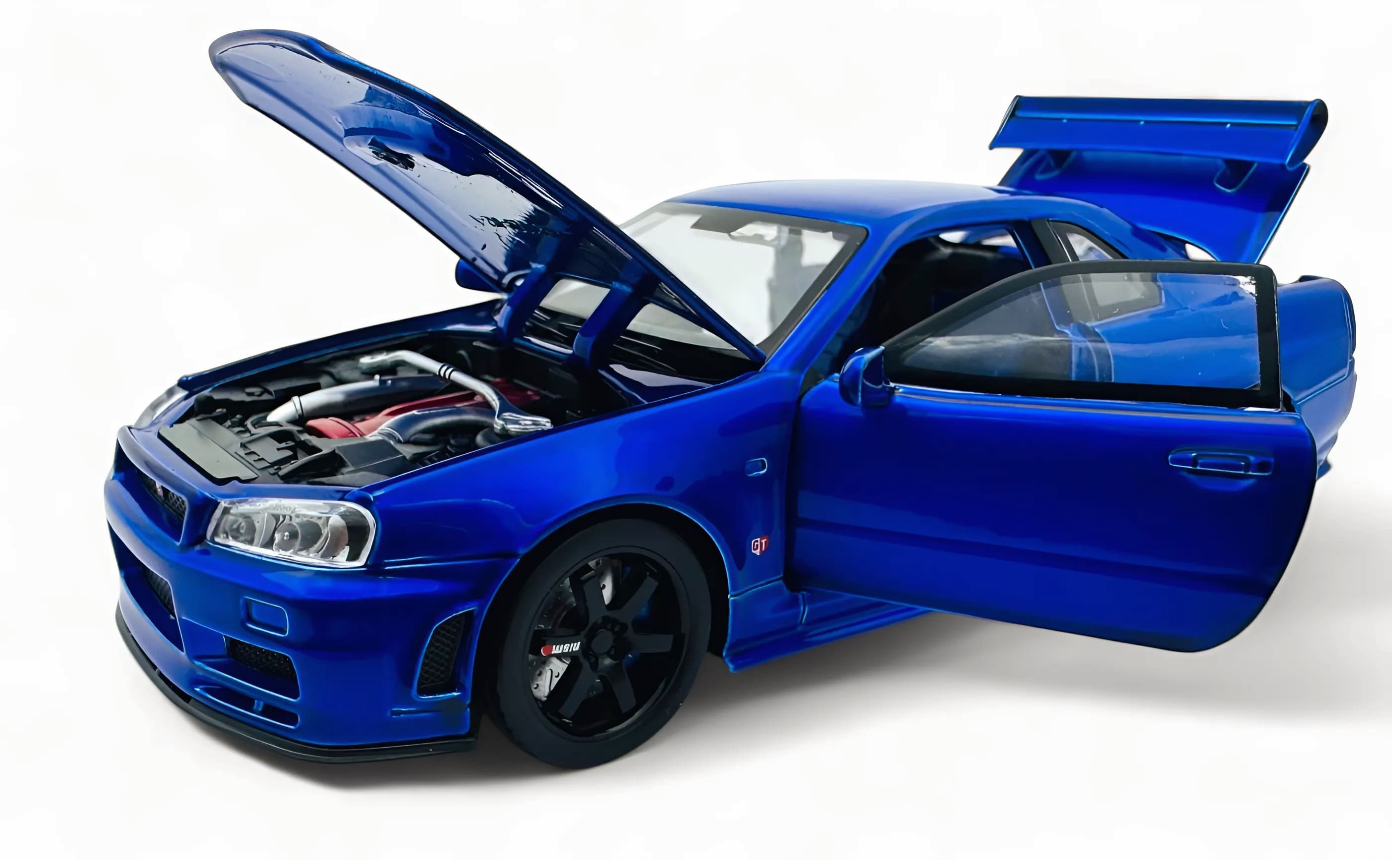 Nissan Skyline R34 GT-R 1:24 diecast scale model car collectible - Multicolor